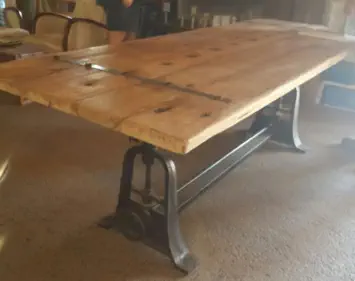 Classic hardwood table with cast iron legs